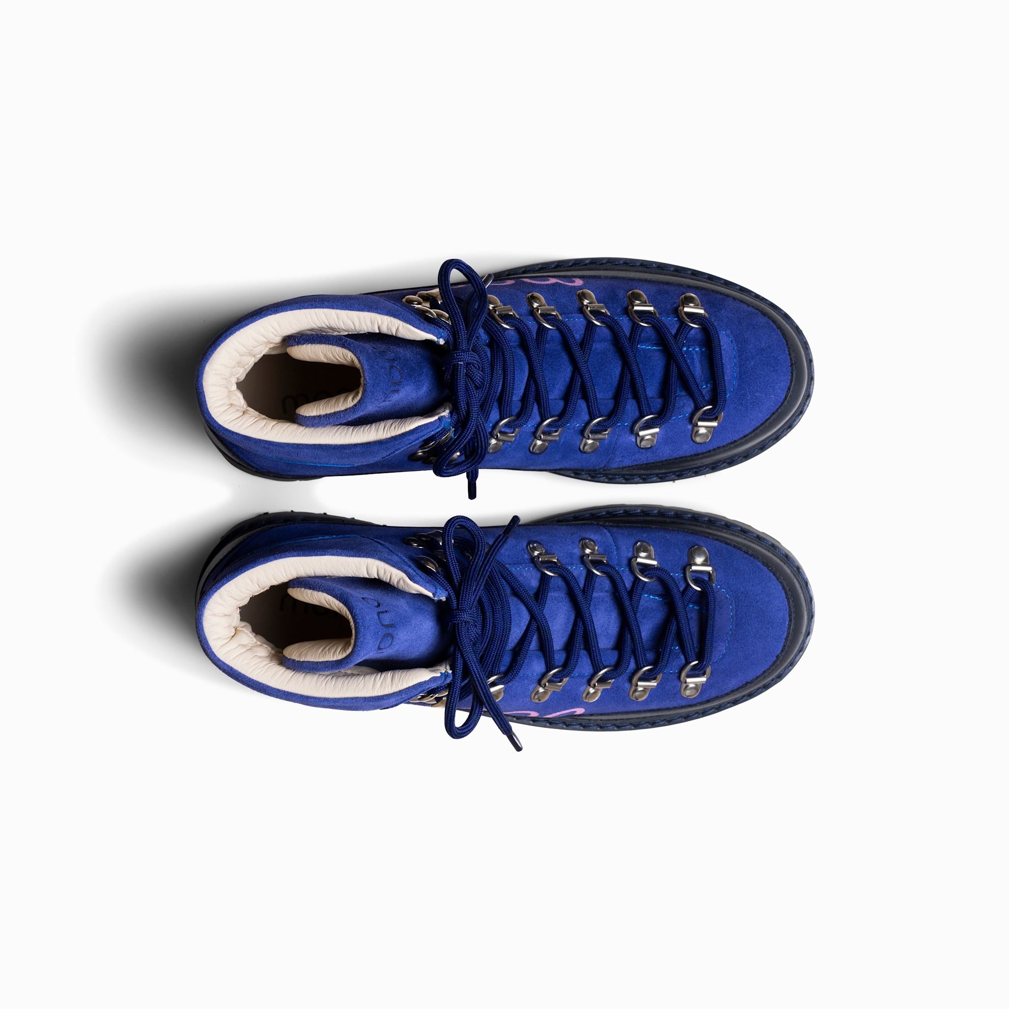 Pair of blue high-top sneakers on a white background