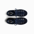 Pair of navy blue hiking boots with laces on a white background