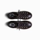 Pair of brown leather boots on a white background